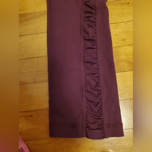 Lululemon City Pulse Pant. Plum / Burgundy color. Size 8. 27" inseam. Ruffled. - Picture 7 of 13
